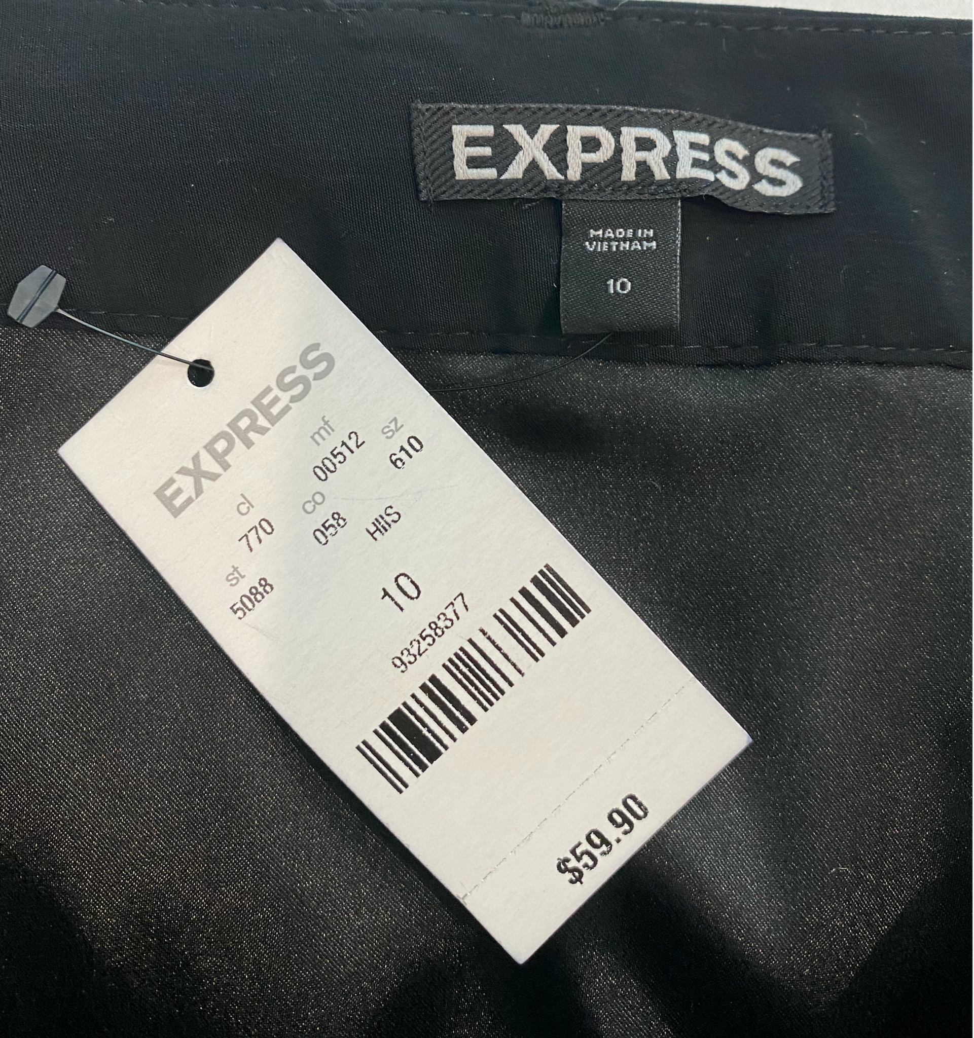 Express Black Belted Mini Skirt with Pockets - NWTExpress black belted silky mini skirt with side and back pockets - New with tags!!