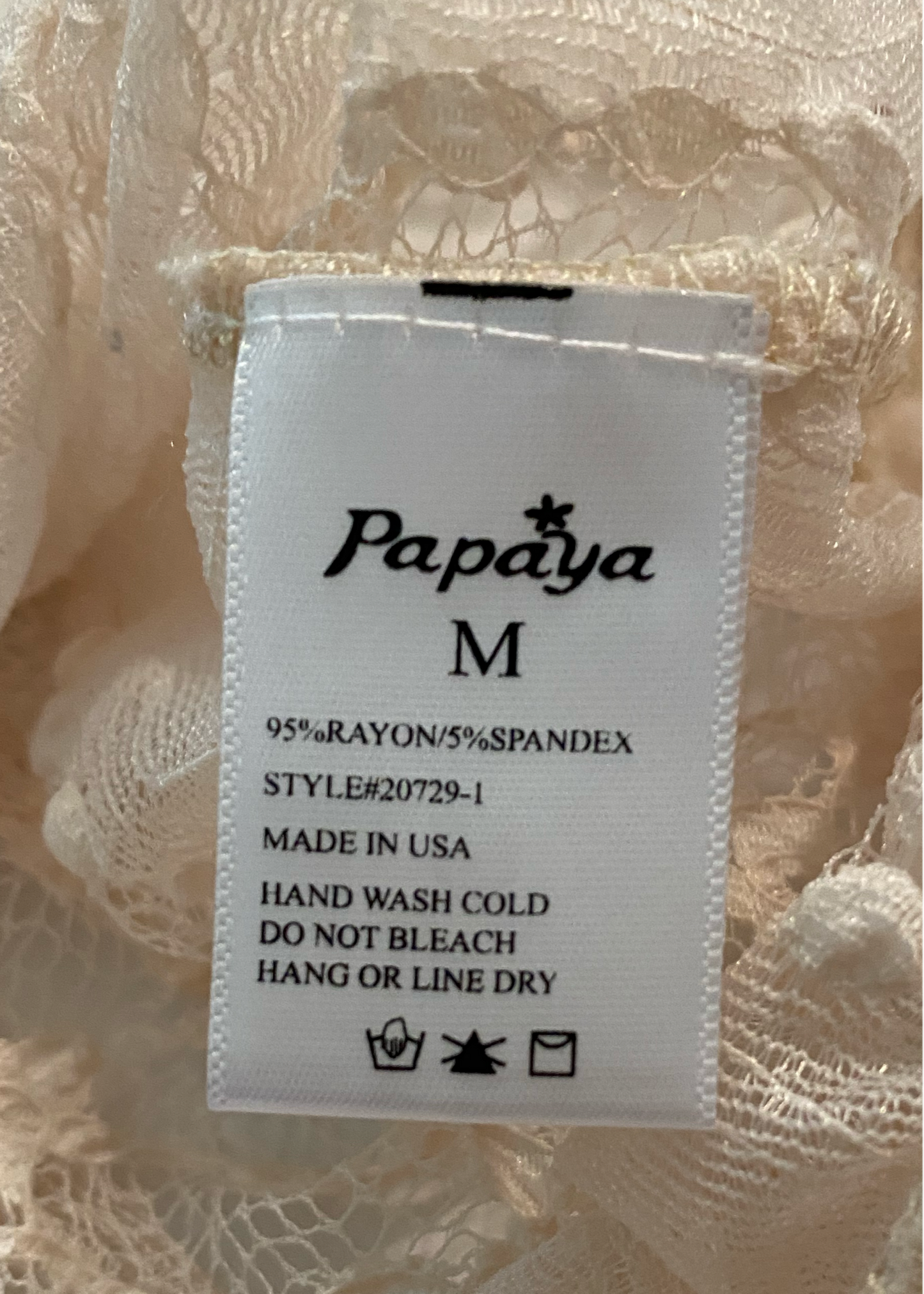 Papaya Sheer Cream Lace TopSoft sheer cream lace top with full 3/4 sleeves and elastic at the cuffs, neckline and waist. 
Change up your jeans with this lace top. Add a long necklace, chunky a
