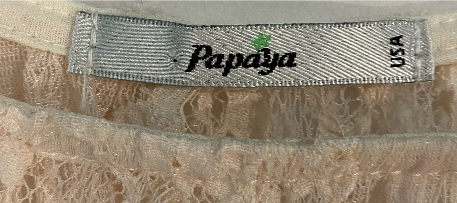 Papaya Sheer Cream Lace TopSoft sheer cream lace top with full 3/4 sleeves and elastic at the cuffs, neckline and waist. 
Change up your jeans with this lace top. Add a long necklace, chunky a
