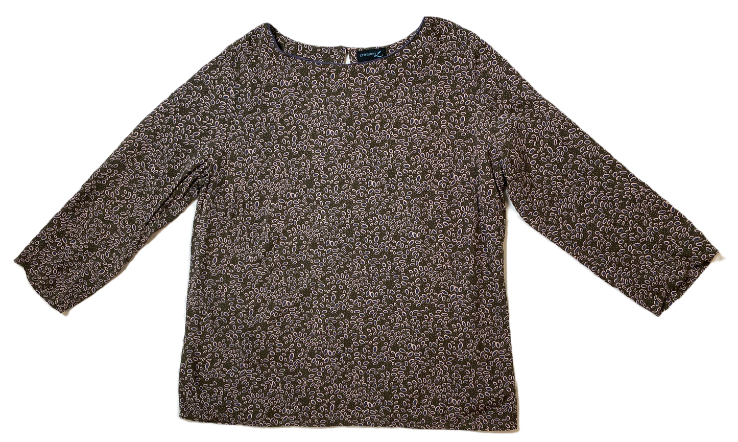 Creation LOlive green with pink and grey print blouse and crew neck.
The colors make this blouse a great basic piece for any closet!Shirts & TopsCreation L 3/4 Sleeve Print BlouseCreation