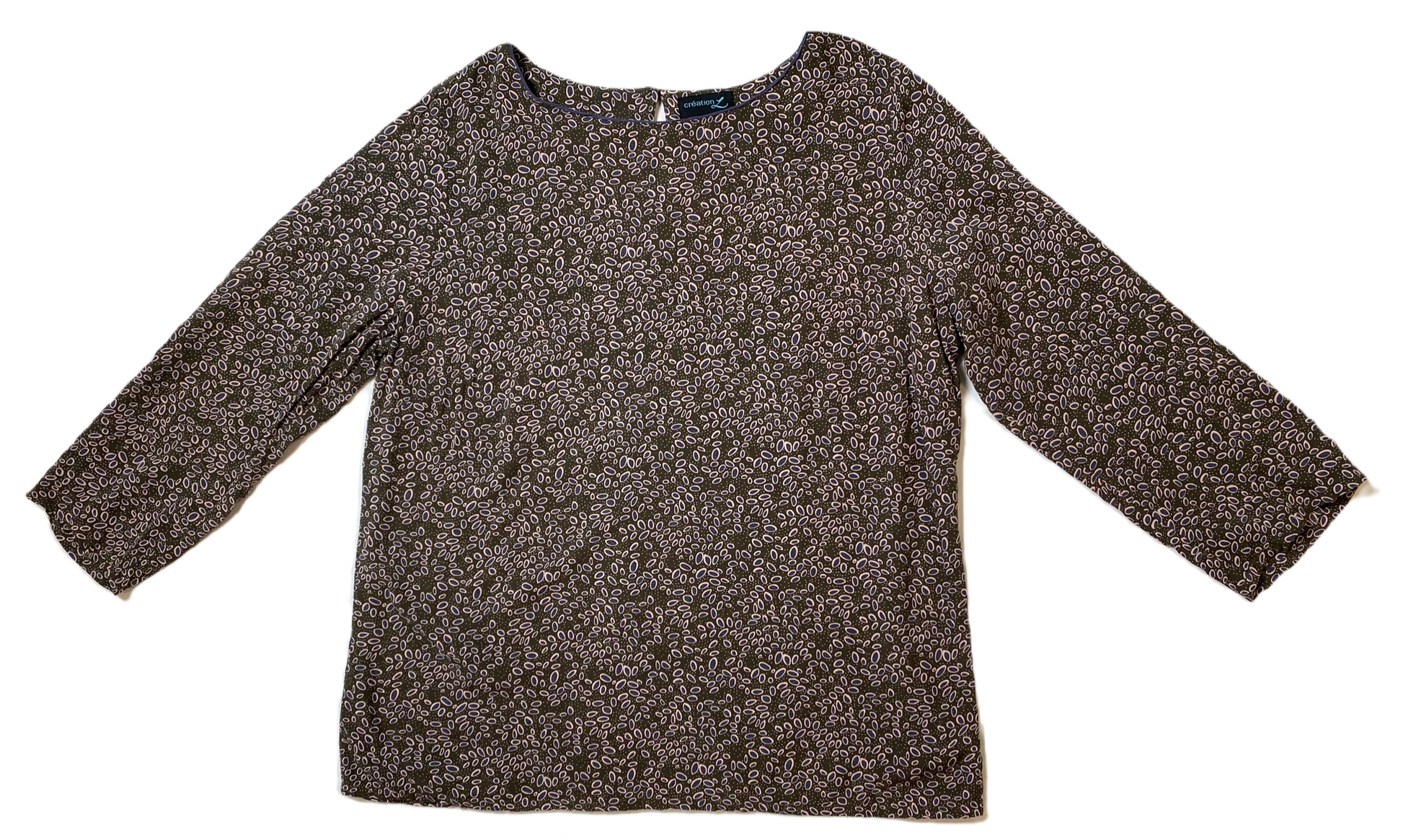 Creation LOlive green with pink and grey print blouse and crew neck.
The colors make this blouse a great basic piece for any closet!Shirts & TopsCreation L 3/4 Sleeve Print BlouseCreation