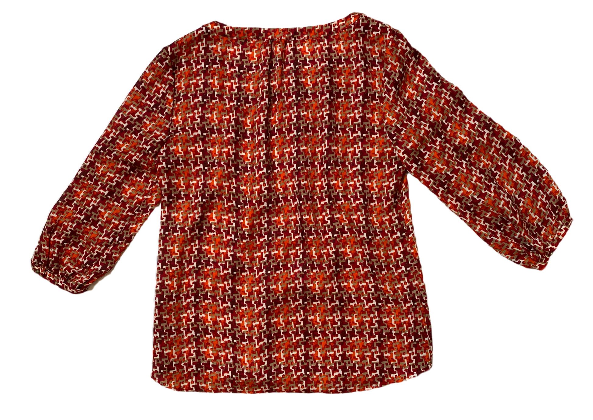 Banana Republic Multi Color Print BlouseBanana Republic fall multi color print blouse with 3/4 sleeves and a split neck with button detail.
This top is a great transition piece to bring you from Summer int