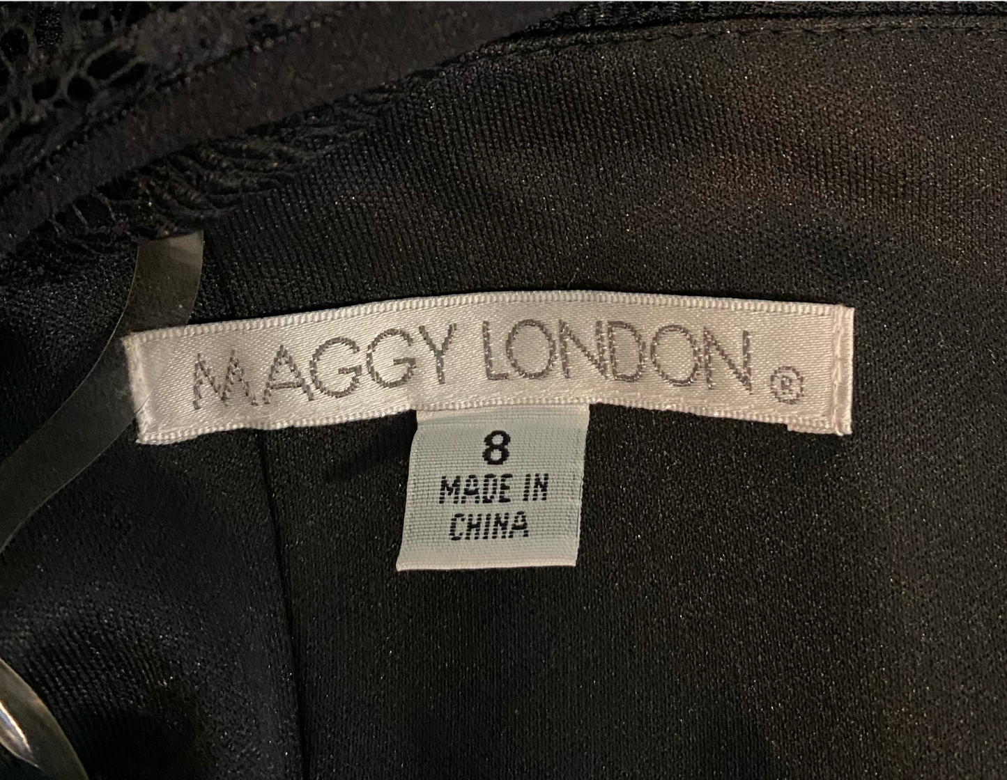 Maggy London Black Fit and Flare - NWTBlack fit and flare with modern soft lace top. Cap sleeves and high v in back. New with Tags!!