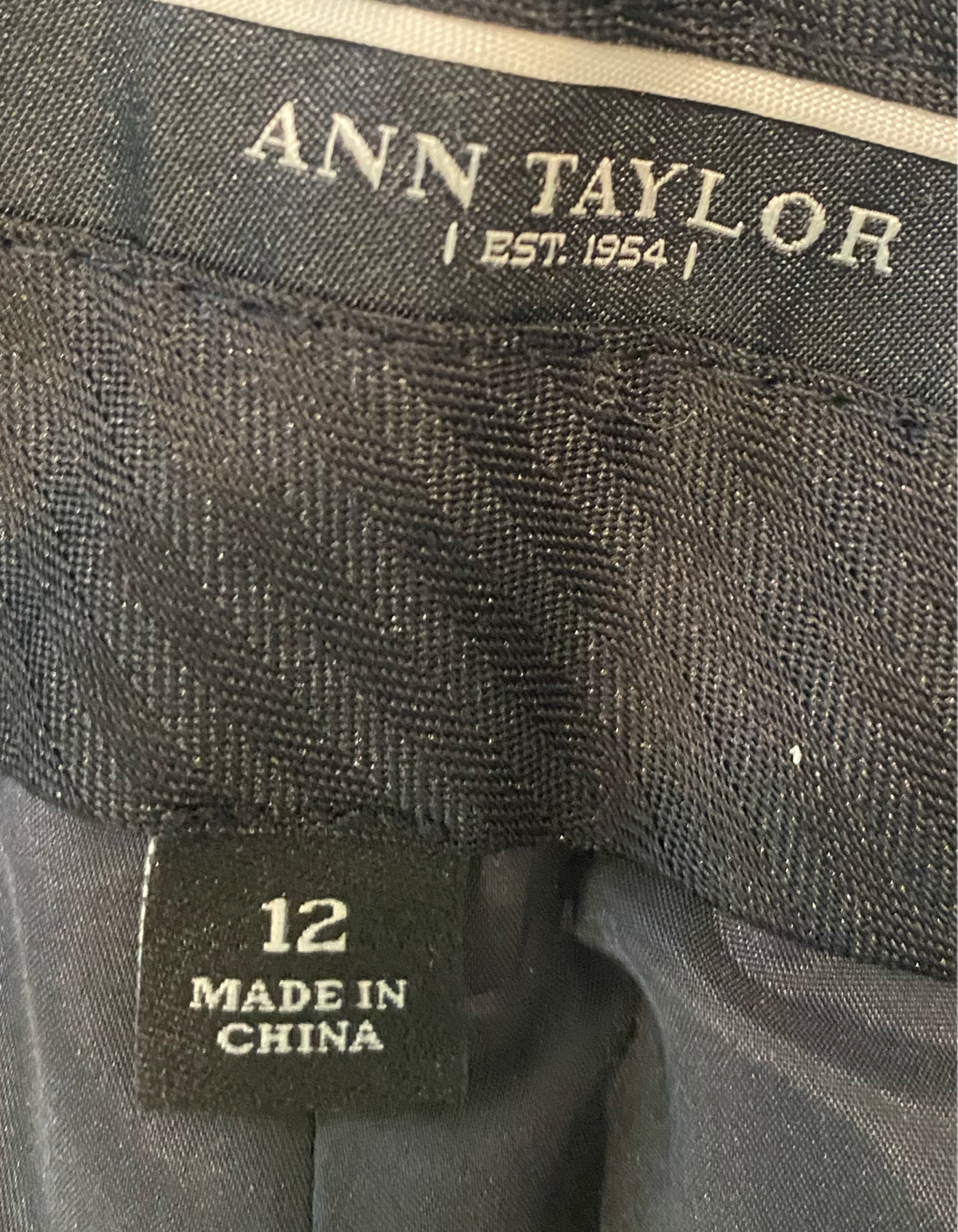 Ann Taylor Dark Grey Wide Leg Pant Lined dark grey cuffed wide leg pants with pockets.
