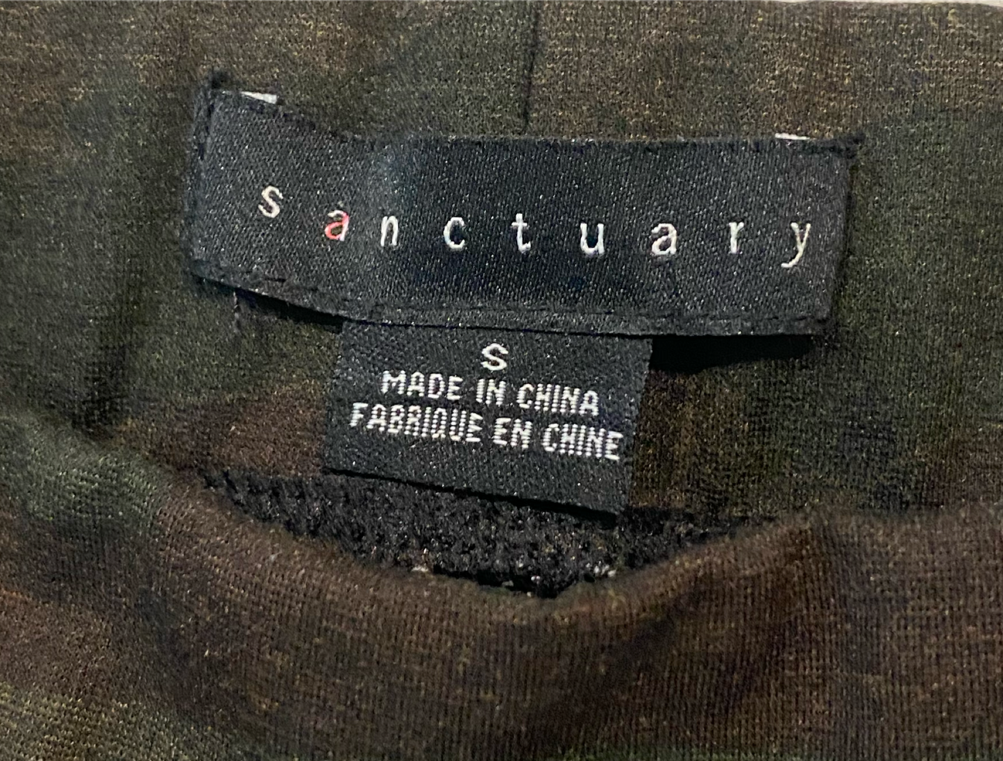 Sanctuary Dark Camo Leggings Dark camo thick fabric leggings with back pockets.Fashionable & comfortable! Wear these this fall with tall boots, denim jacket and a scarf!