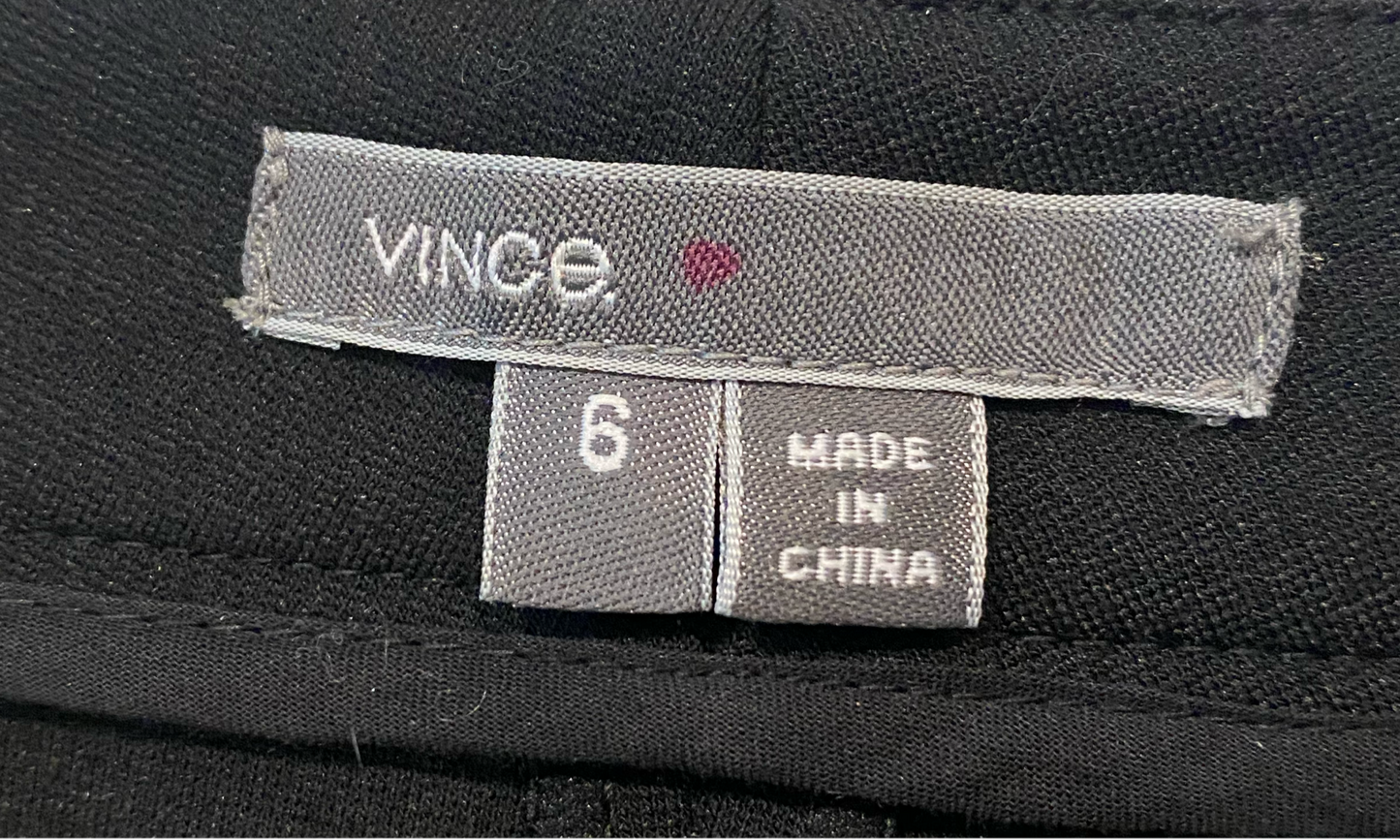 Vince Black Pencil Leg PantFlat front black pants with zipper pockets.
These should be in every closet. A classic pant with a modern look.