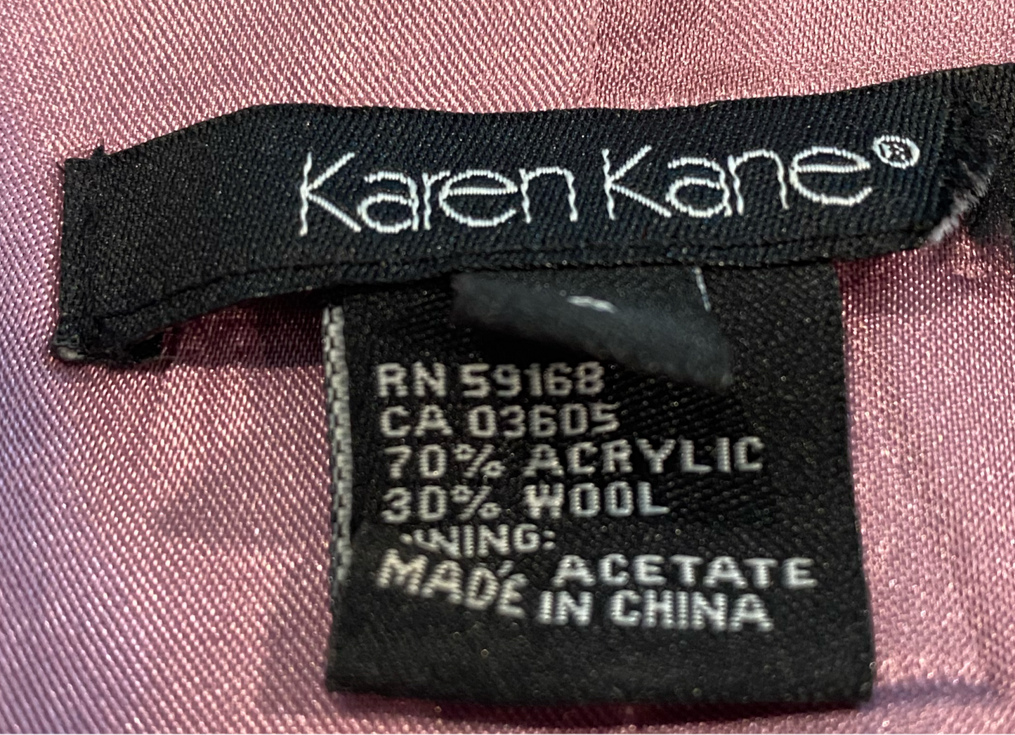 Karen Kane Blazer with Ruffle Hem and CuffsPlum colored lined blazer with covered buttons, ruffle hem and cuffs.
Wear this with jeans and chunky heels for a great looking outfit!