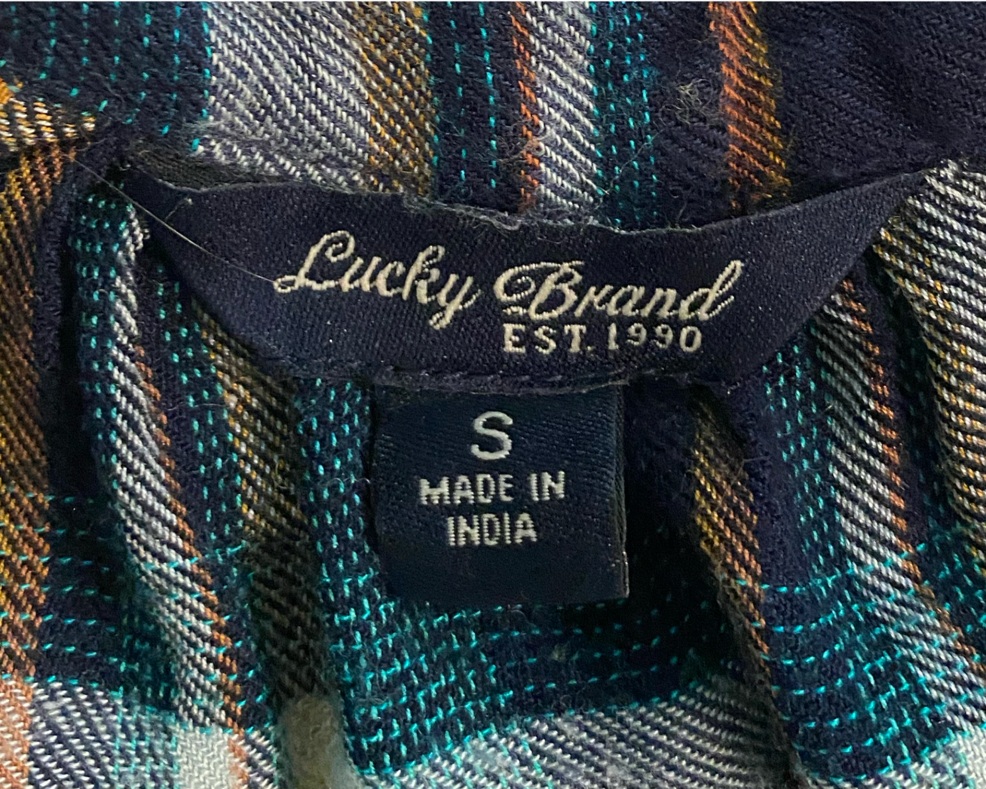 Lucky Brand Henley Style Teal Plaid Flannel Size Small  Get ready to be the luckiest cat around in this Lucky Brand Teal Plaid Flannel! With a playful Henley style a