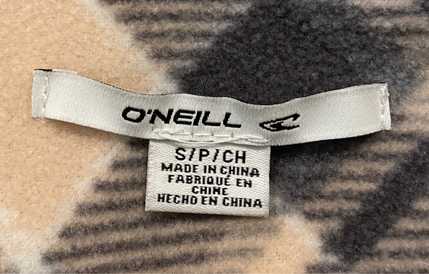 O'Neill Fleece Snap Front Plaid Jacket Stay cozy and stylish with the O'Neill Fleece Snap Front Plaid Jacket! Made by O'Neill, this jacket features a peach, grey, an