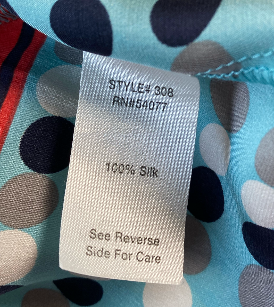CAbi Aqua Silk Tank with Black & White DotsSuch a cool tank!  It has a draped neckline and adjustable straps. And it's silky soft!  Dress it up or down, you will love it either way!