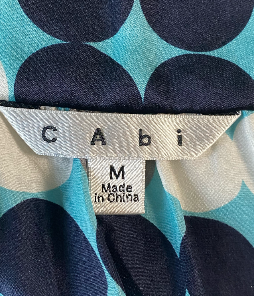 CAbi Aqua Silk Tank with Black & White DotsSuch a cool tank!  It has a draped neckline and adjustable straps. And it's silky soft!  Dress it up or down, you will love it either way!