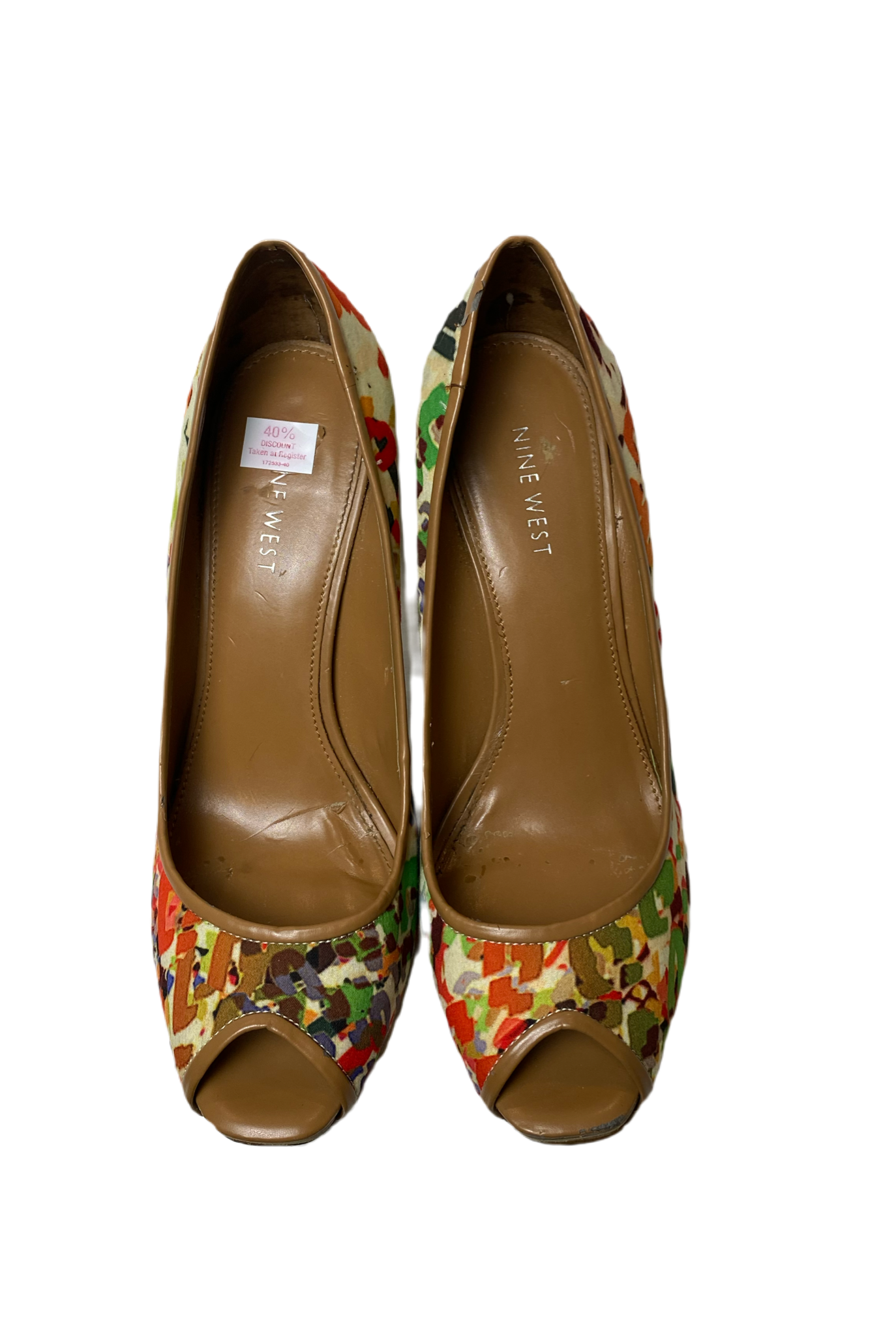 Nine West Multi Color Peep Toe Pump Nine West multi color peep toe pump.
So many colors, these will go with any outfit!