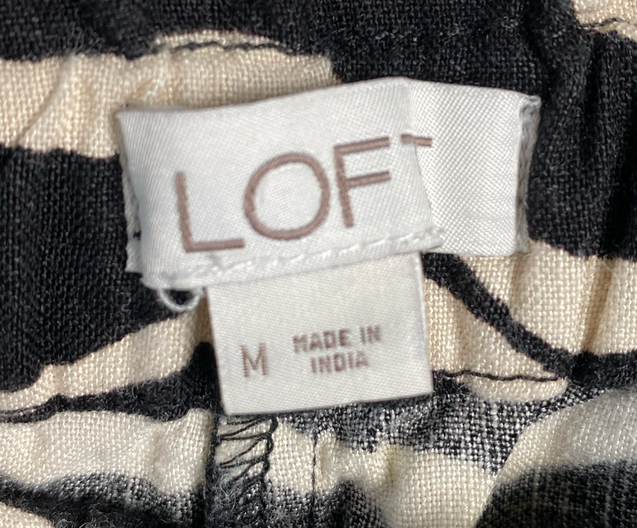 Loft Zebra Striped Shorts!Such a cute pair of shorts!  Any color you choose will look great with them.  Go easy with black, go crazy with fuchsia!  You set the mood!