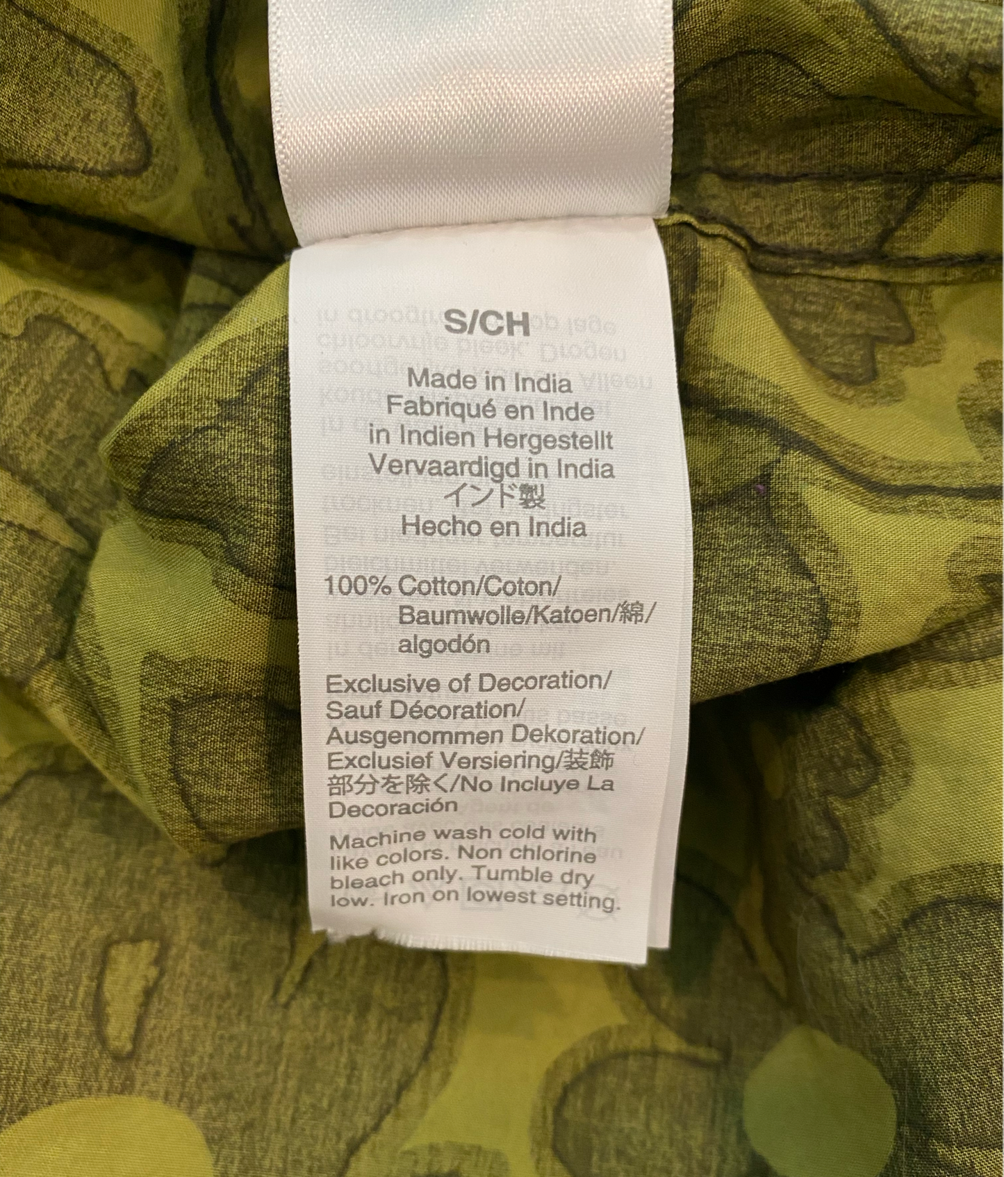 J Crew Floral Print Button Blouse Elevate your wardrobe with this abstract floral blouse from J Crew. Its vibrant green and chartreuse color is perfect for spring and summer. The button-down style an