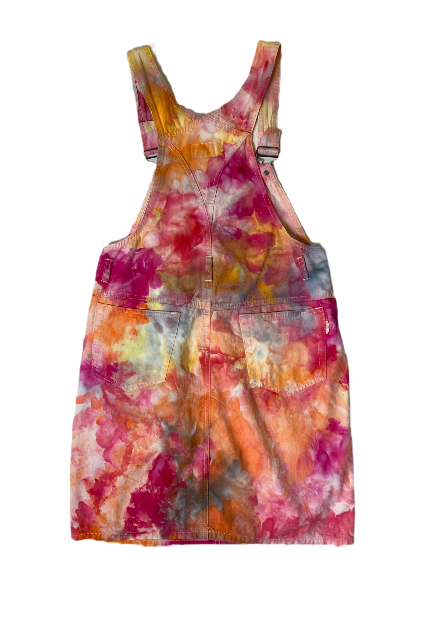 REFRESHED - Squeeze Canvas Skirt Overalls  Get ready to squeeze into style with our REFRESHED Squeeze Canvas Skirt Overalls. Hand dyed with a bright and playful mix
