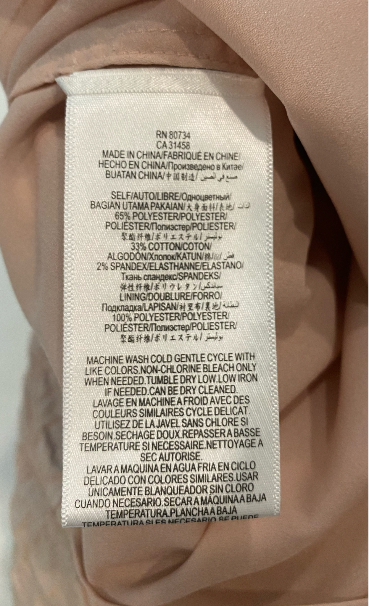 BCBG Maxazria Sleeveless Blush Jacquard Dress Exude elegance and sophistication in the BCBG Maxazria Sleeveless Blush Jacquard Dress. The intricate blush jacquard d