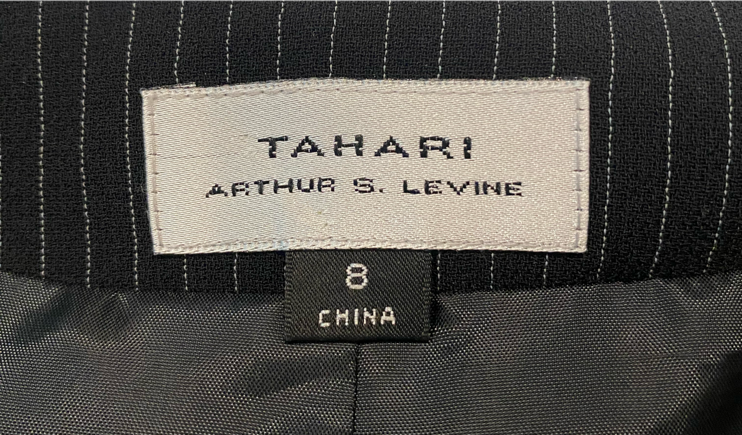 Tahari Author S Levine Vintage Pinstripe VestClassic beautifully tailored black pinstriped vintage vest from Tahari. 
Pair this with wide leg jeans or pants and a bright color top for a trending look.