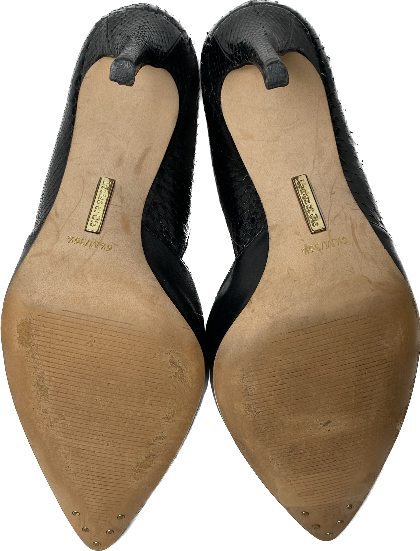 Louie et Cie Black D'Orsay Pumps Classic black d'orsay pump with Amazon Snakeskin on the back half of shoe and Coastal Calf Leather on the front. They feature 3.5" heels.
Looking for the ideal shoe