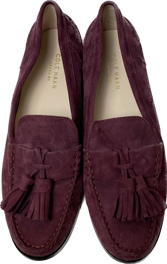 Cole Haan Plum Faux Suede Slip-On Tassel LoafersOn trend plum faux suede tassel loafers. So cute and easy to wear.
Wear these to work with black slacks, and on the go with jeans.