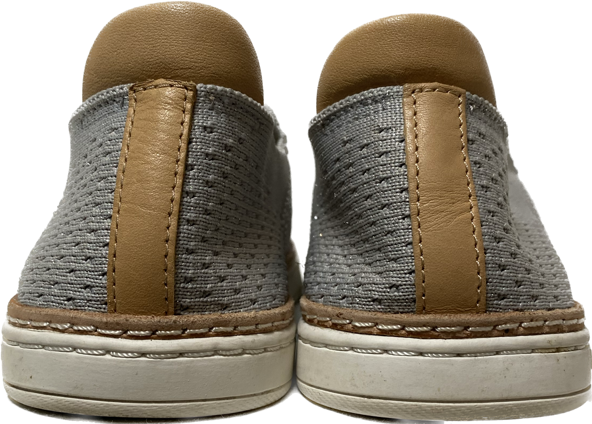 Ugg Grey Sammy Slip-OnsThese stretch knit slip-ons have just the right amount of sparkle subtly woven in. 
Great shoes for casual weekend wear!Ugg Grey Sammy Slip-OnsShoes