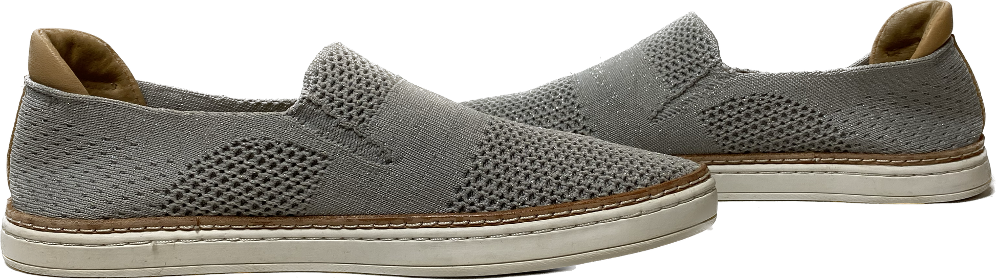 Ugg Grey Sammy Slip-OnsThese stretch knit slip-ons have just the right amount of sparkle subtly woven in. 
Great shoes for casual weekend wear!Ugg Grey Sammy Slip-OnsShoes