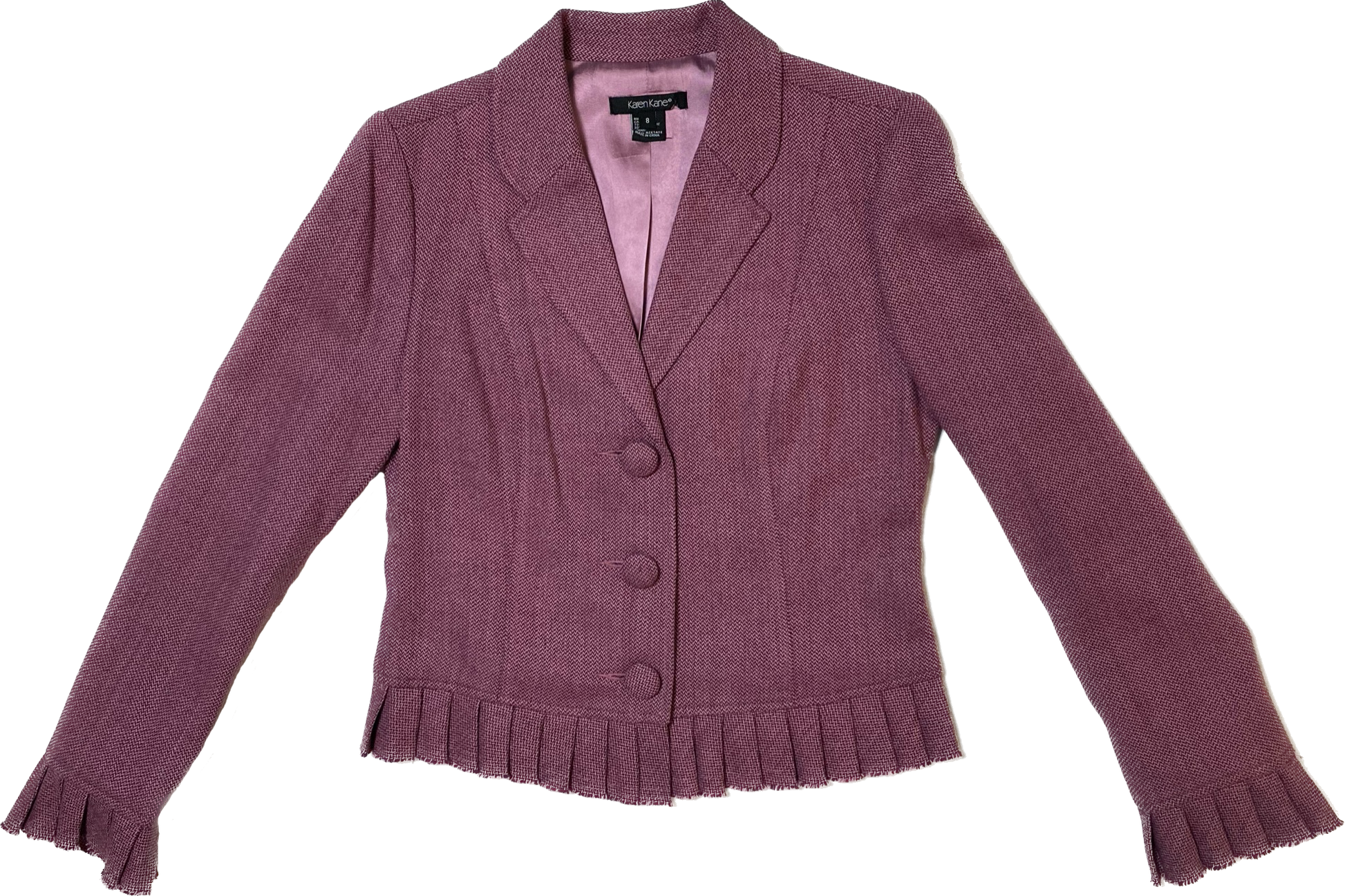 Karen Kane Blazer with Ruffle Hem and CuffsPlum colored lined blazer with covered buttons, ruffle hem and cuffs.
Wear this with jeans and chunky heels for a great looking outfit!