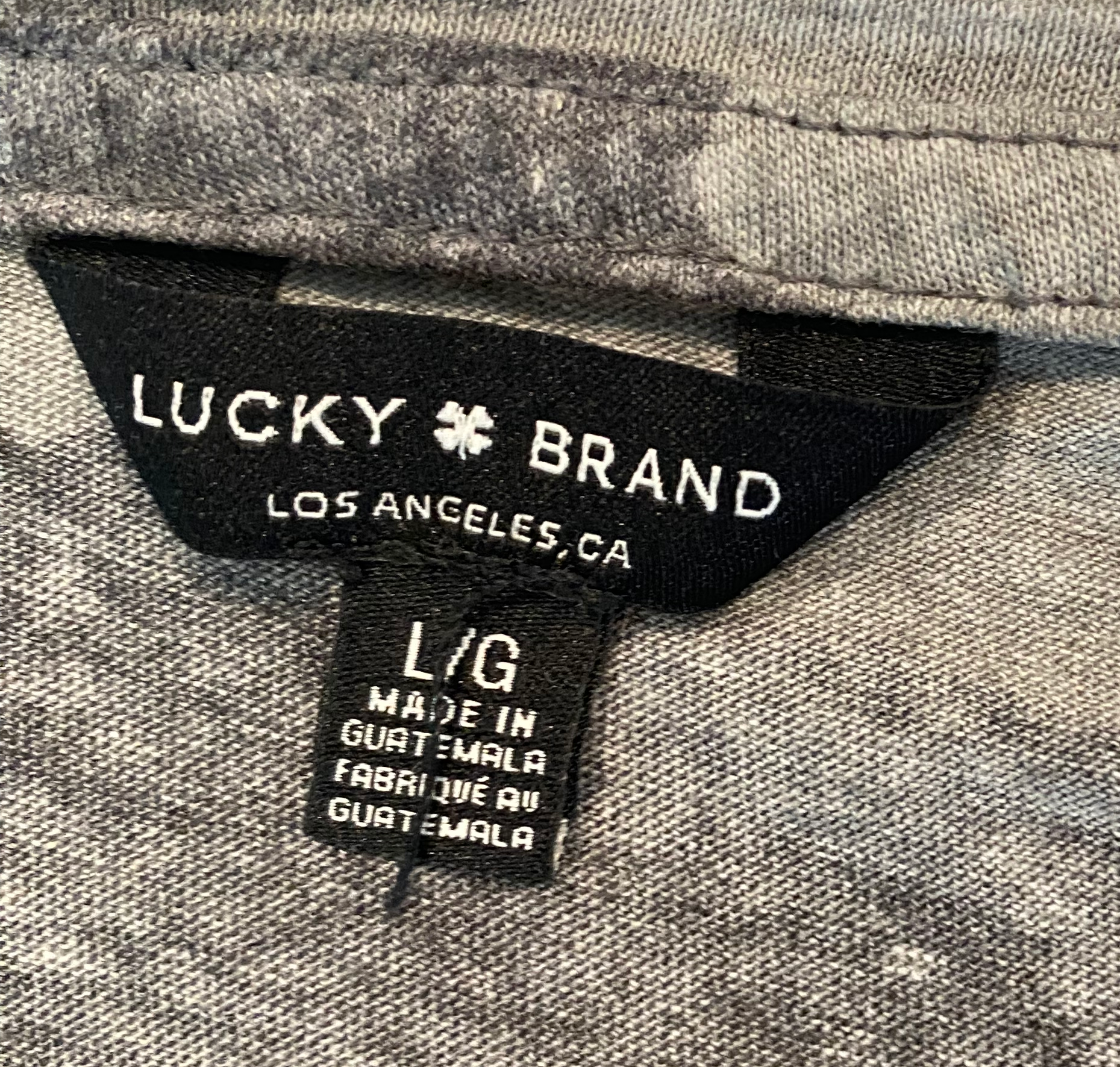 Lucky Brand Cap Sleeve Camo T-Shirt Size Large Get lucky with this camo printed t-shirt from Lucky Brand! Featuring a twist front and cap sleeves, this shirt adds a Lucky Brand Cap Sleeve Camo T-ShirtElevate your causal look with this on trend knot front camo t-shirt with rolled cap sleeves.