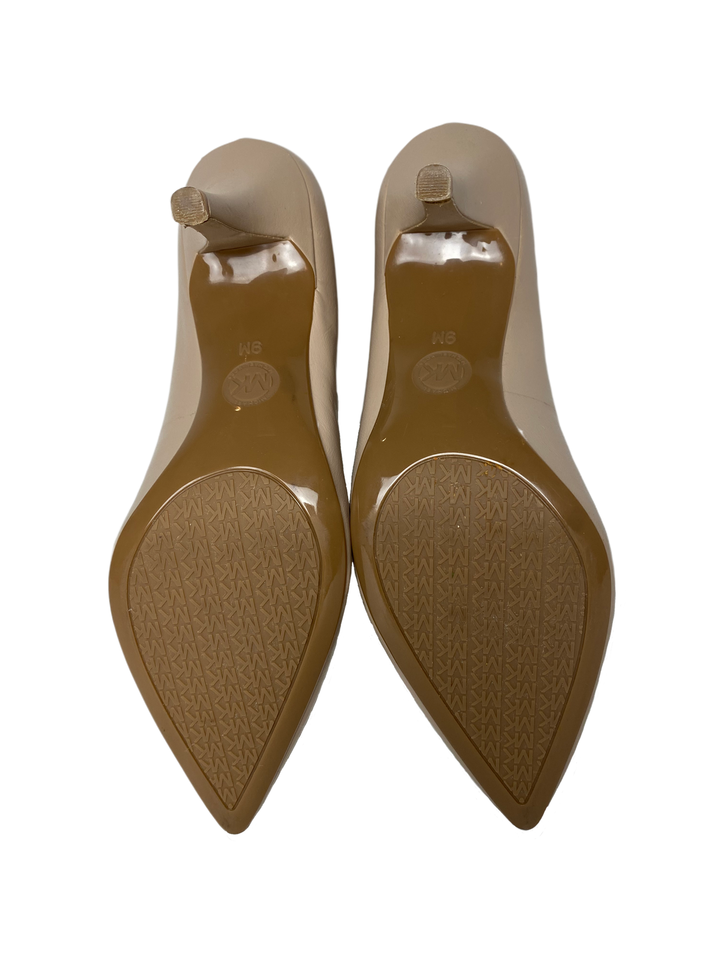 Michael Kors Nude Leather Pointed Toe PumpsPerfect shoes for that every day elevated basic. Wear to work or a casual night out.
Note: Two small holes on outside of left shoe.  Price is marked accordingly.