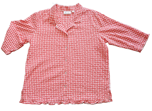 d & Co Orange Gingham Blouse with Ruffled Hem and CuffsSuch a cute and flirty blouse, with ruffle details at the hem and cuffs. And the orange gingham is perfect for a day out!