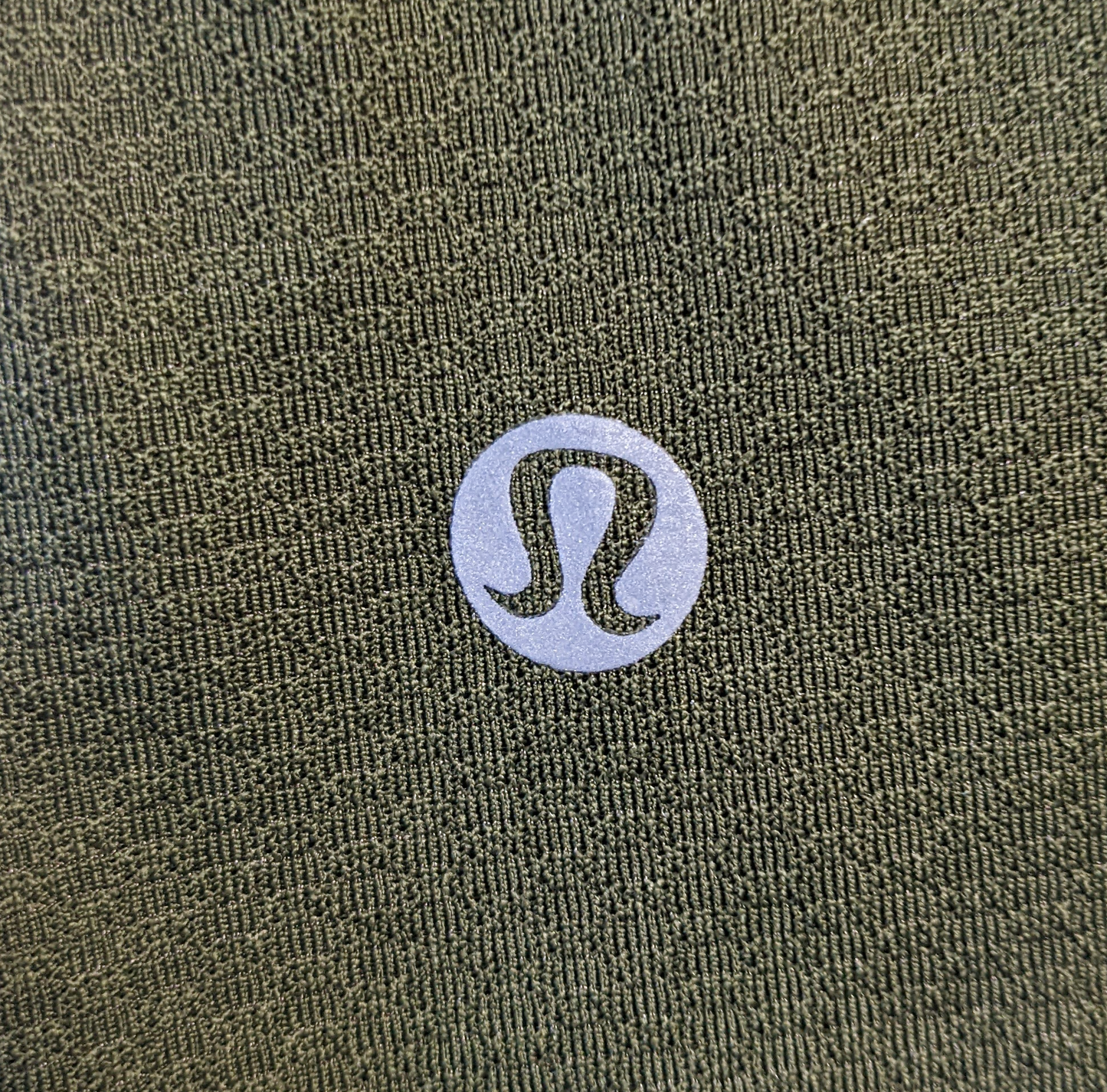 Lululemon Olive Green Split Back Tank  Experience ultimate comfort and style with the Lululemon Olive Green Split Back Tank! Made with high quality fabric, this tank