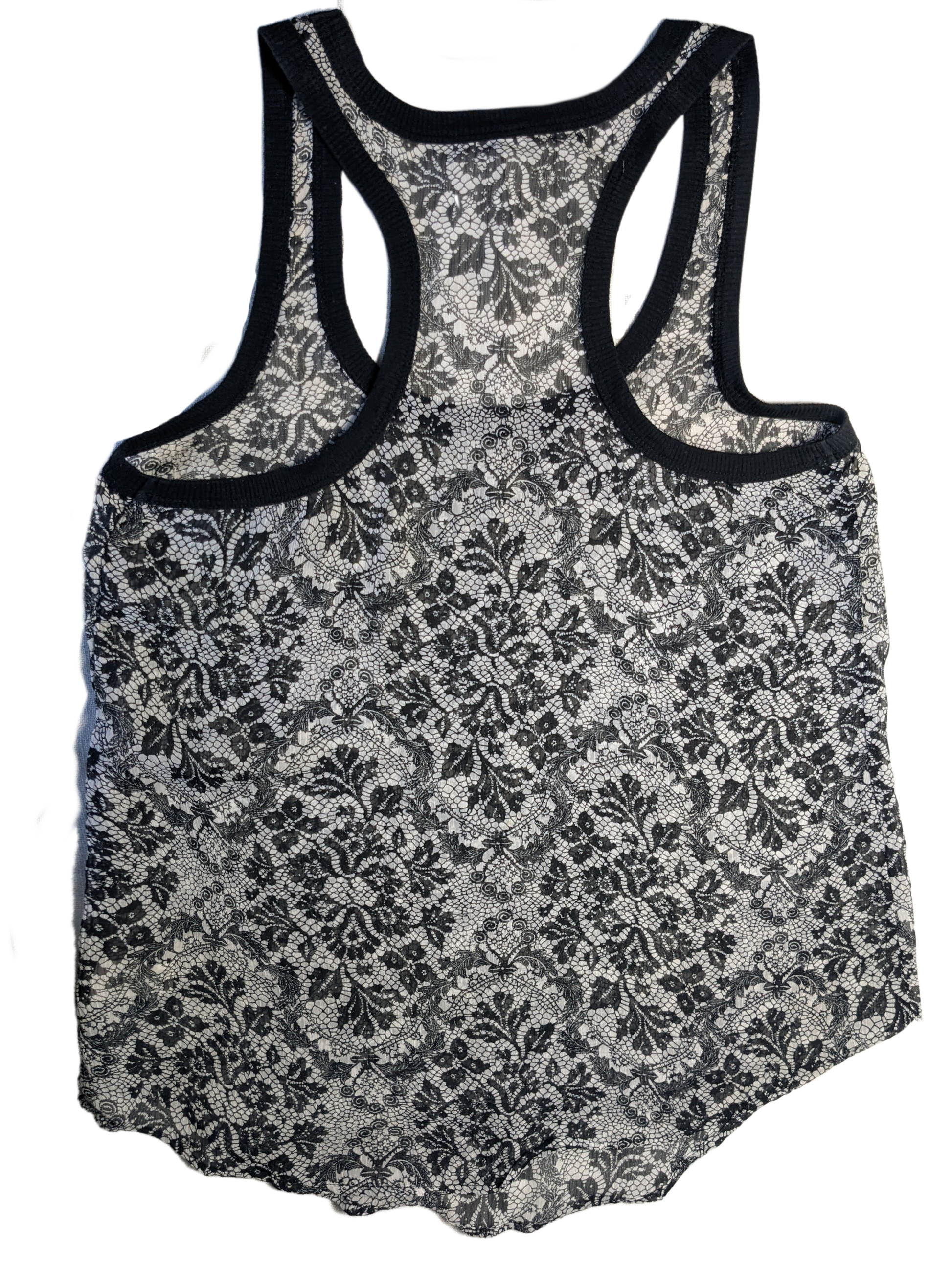 Full Tilt Racerback Lace Printed TankThis is a perfect tank to layer under your favorite sweater, or a denim jacket!  The print will elevate whatever you are wearing!