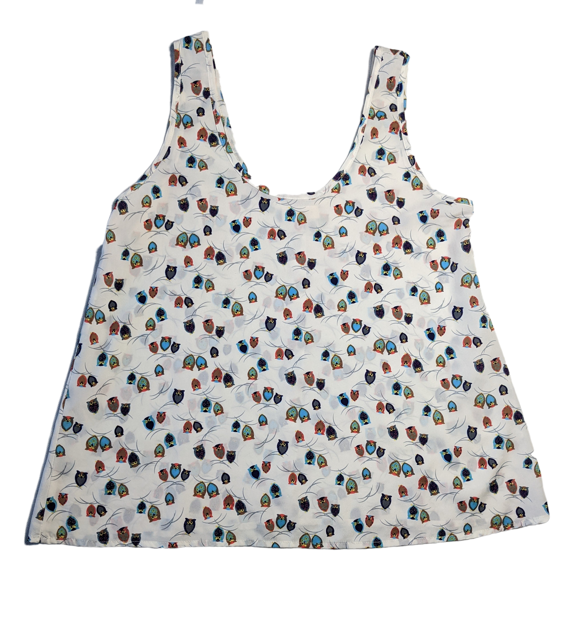 Phanuel Owl Print TankThis tank has the cutest print!  Little owls are scattered all over this tank!  And, you can't really tell they are owls until you get up close!  So cute!