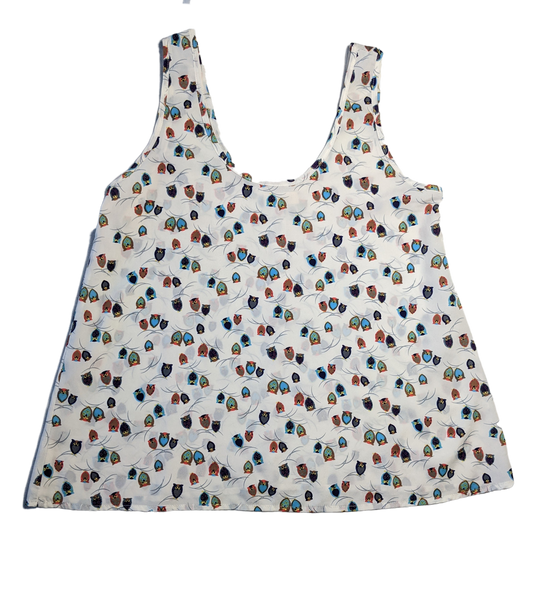 Phanuel Owl Print TankThis tank has the cutest print!  Little owls are scattered all over this tank!  And, you can't really tell they are owls until you get up close!  So cute!