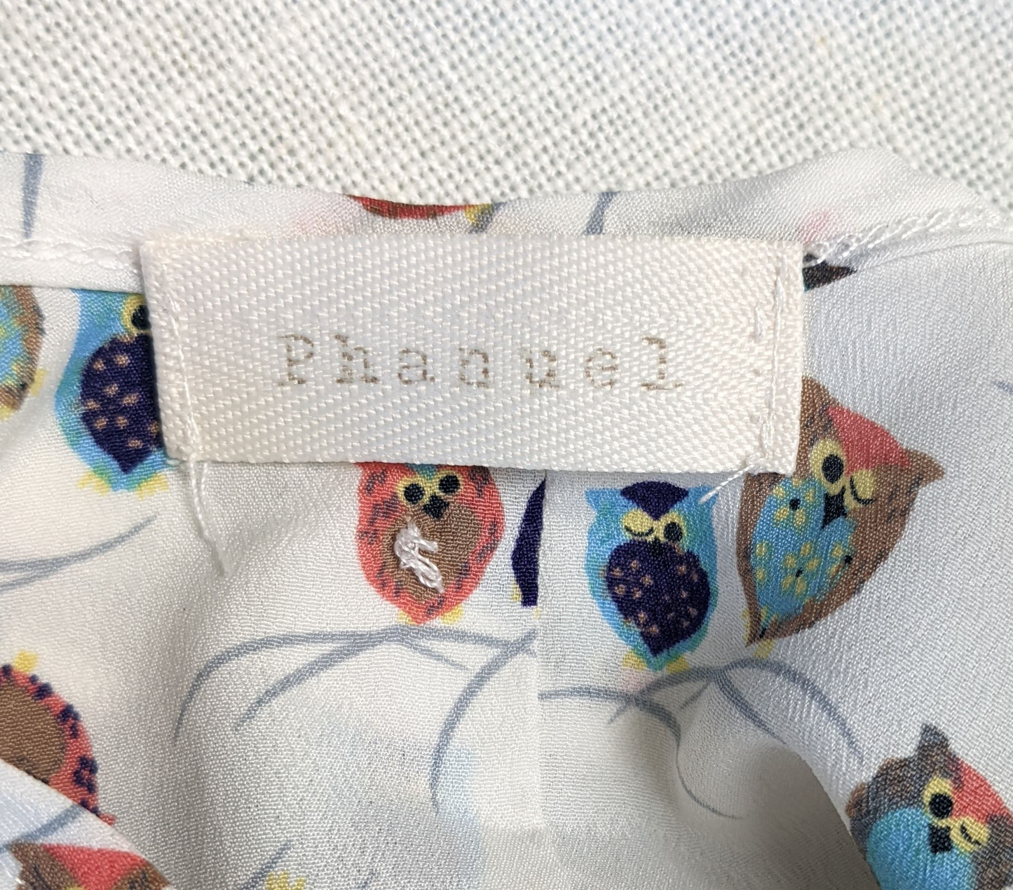 Phanuel Owl Print TankThis tank has the cutest print!  Little owls are scattered all over this tank!  And, you can't really tell they are owls until you get up close!  So cute!