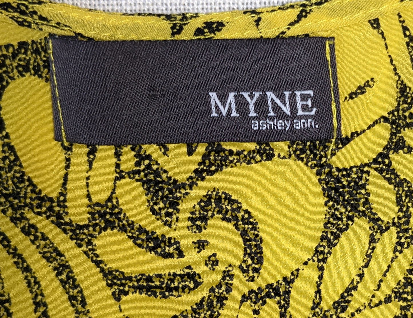 MYNE ashley ann printed tank topGorgeous color and print on this tank!  What a great way to add a pop of color to your outfit.  Wear it with a nice pair of jeans and a black blazer or jacket. Or wi