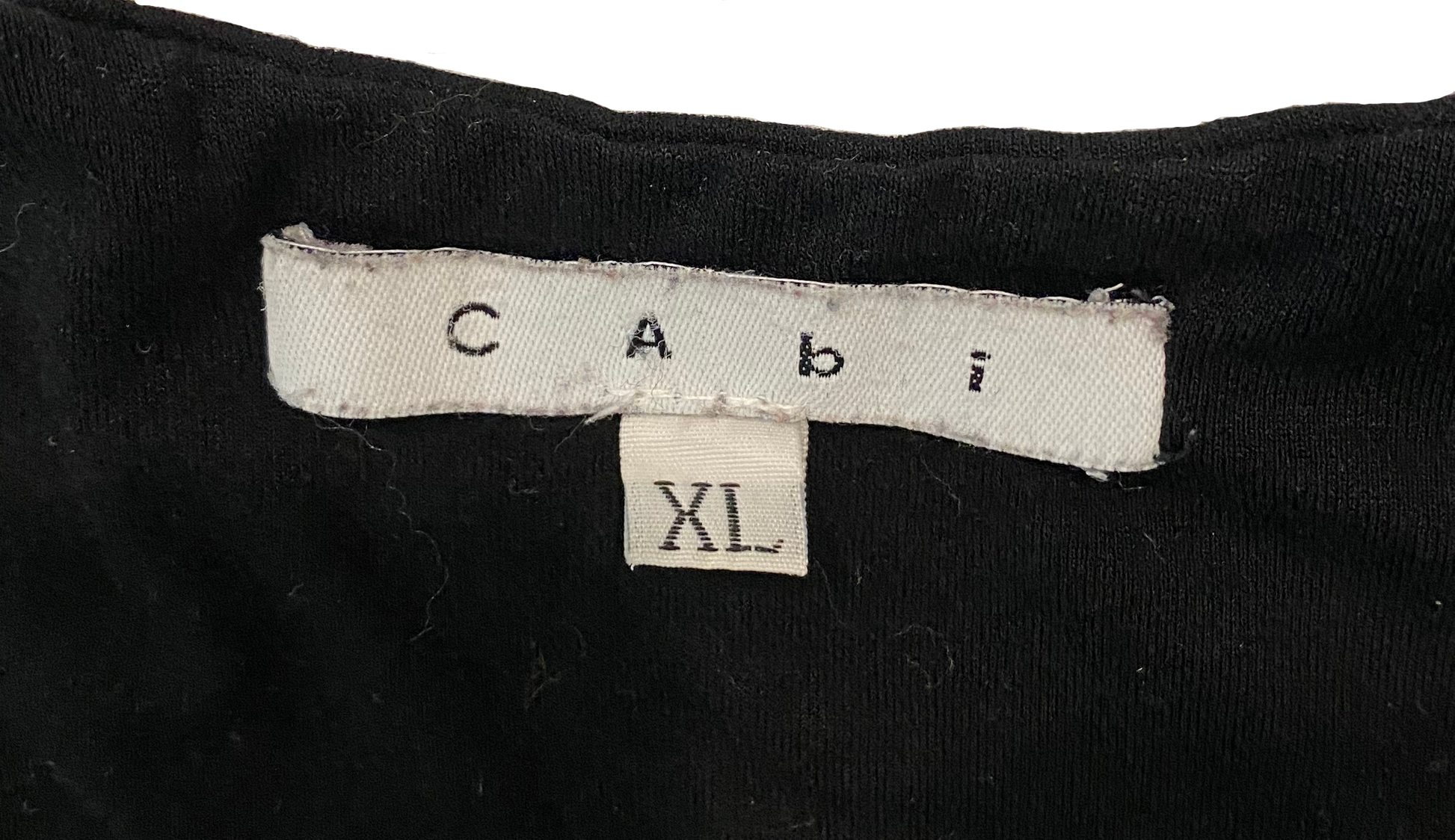 CAbi Black V-Neck Sleeveless Top This is a great basic v-neck tank. Wear as is, or as a layering piece.