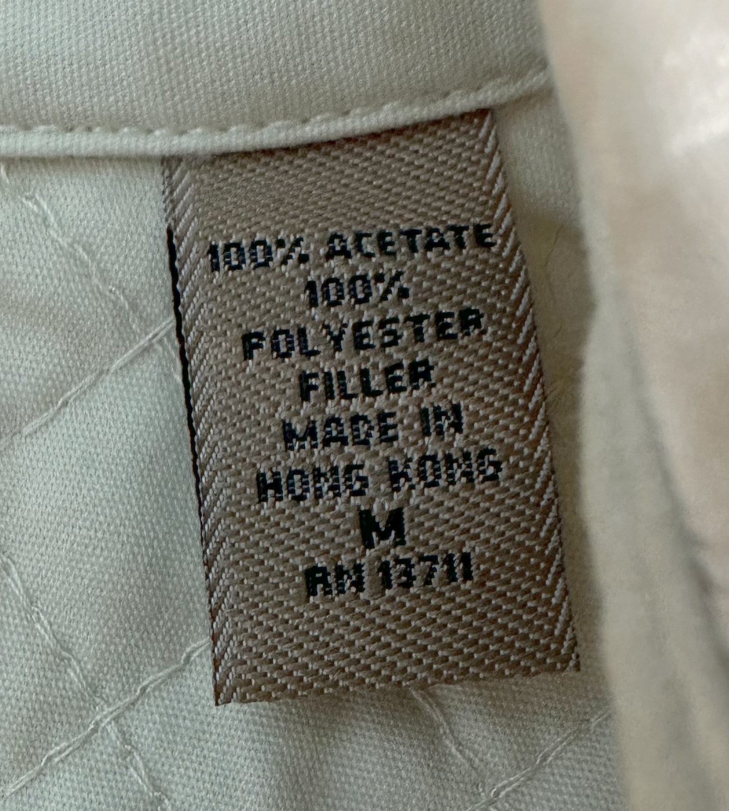 i.e. relaxed Cream Quilted Jacket with Metal Hook ClosuresWhat a beautiful jacket. So much thought went into all the details. From a pattern sewn within the quilting, epaulets, to smooth brushed metal hook closures. This jarelaxed Cream Quilted JacketJacket