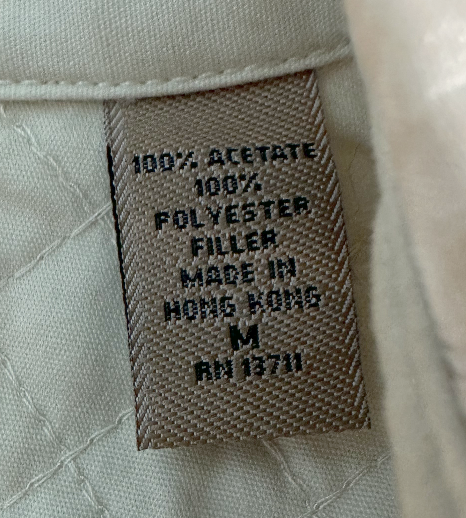 i.e. relaxed Cream Quilted Jacket with Metal Hook ClosuresWhat a beautiful jacket. So much thought went into all the details. From a pattern sewn within the quilting, epaulets, to smooth brushed metal hook closures. This jarelaxed Cream Quilted JacketJacket