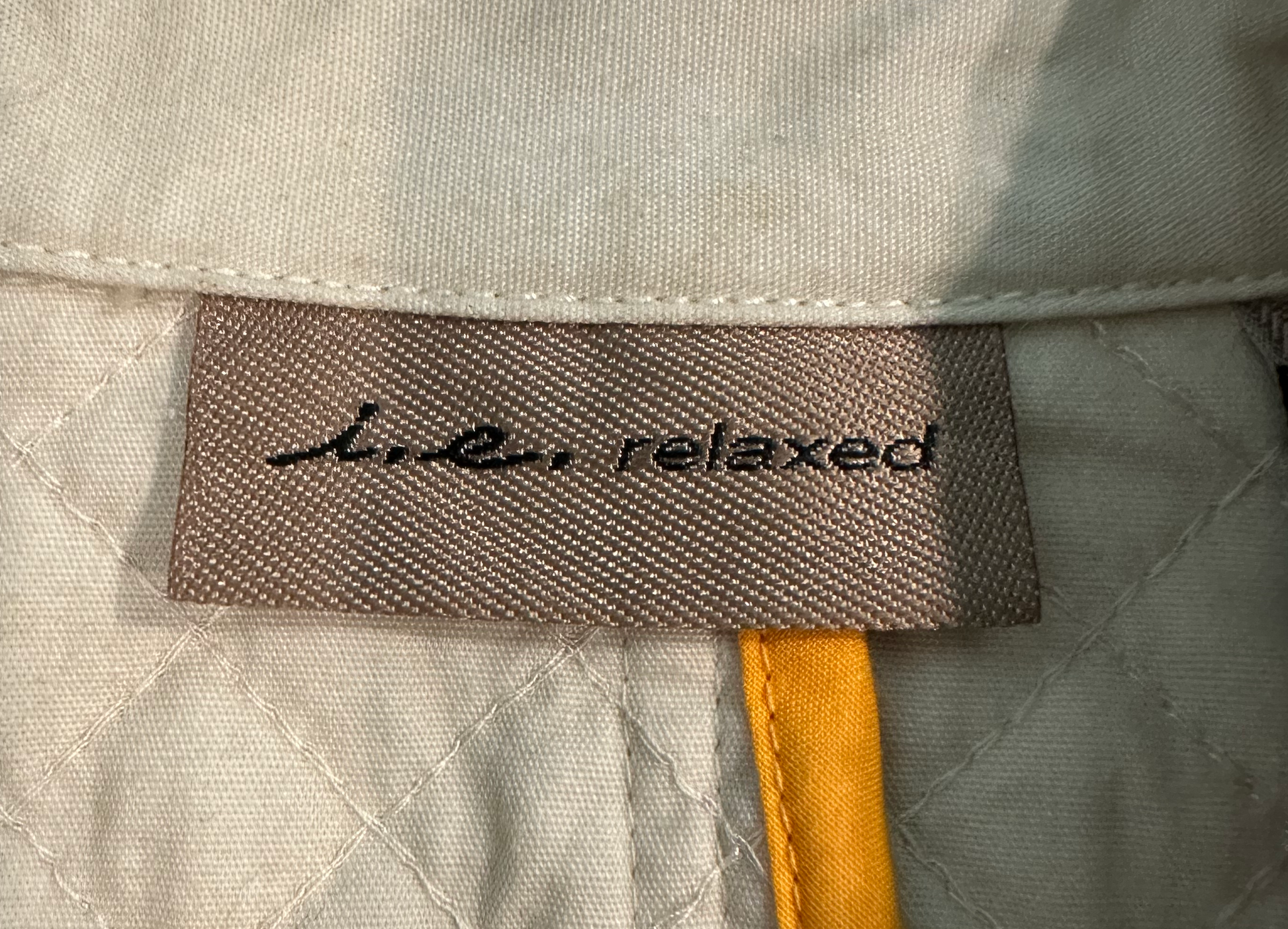i.e. relaxed Cream Quilted Jacket with Metal Hook ClosuresWhat a beautiful jacket. So much thought went into all the details. From a pattern sewn within the quilting, epaulets, to smooth brushed metal hook closures. This jarelaxed Cream Quilted JacketJacket