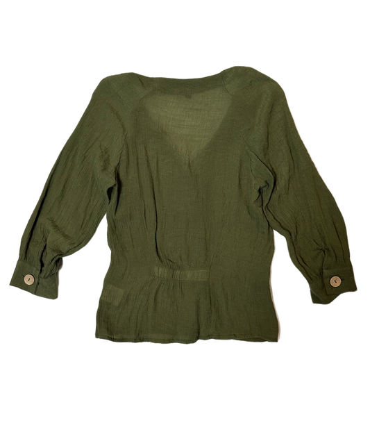 OLM Green Gauze Button Front BlouseWear this blouse to work, than change into chunky heels for a casual dinner out. The light weight fabric makes it perfect for those warmer nights.OLM Green Gauze Button Front BlouseShirt