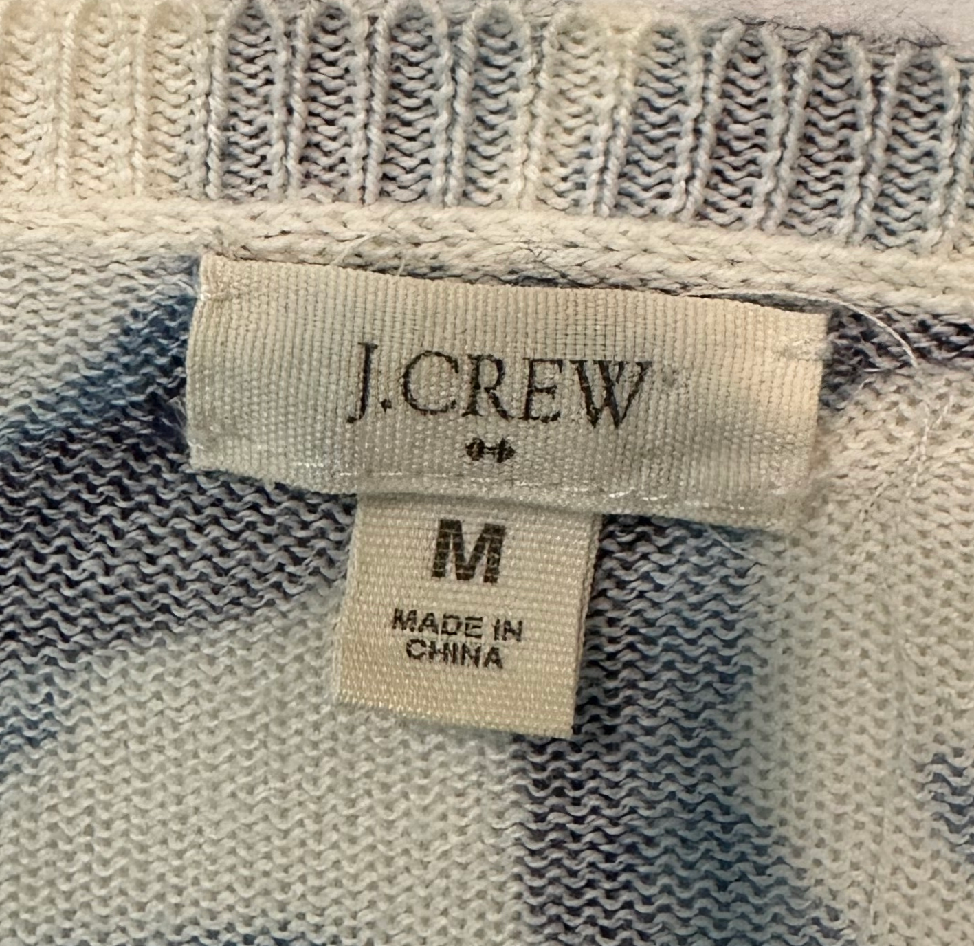 J Crew Blue Swirl Print Light Weight CardiganThis J Crew white with blue & black swirl print cardigan is crafted with 100% cotton, making it lightweight and comfortable. Featuring a classic 3/4 sleeve lengtCrew Blue Swirl Print Light Weight CardiganSweater