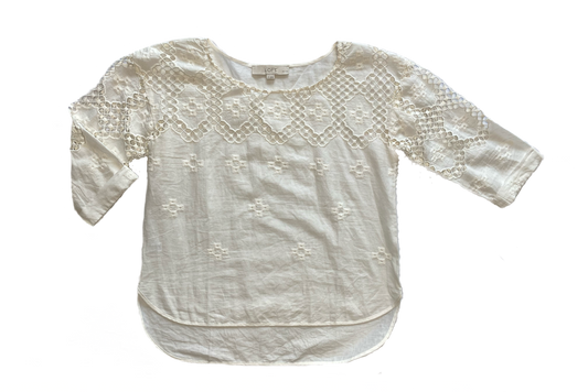Loft Off White Top with Crochet Details  Elevate your style with this playful LOFT top. Featuring charming crochet details, 3/4 length sleeves, and a trendy shirttail he