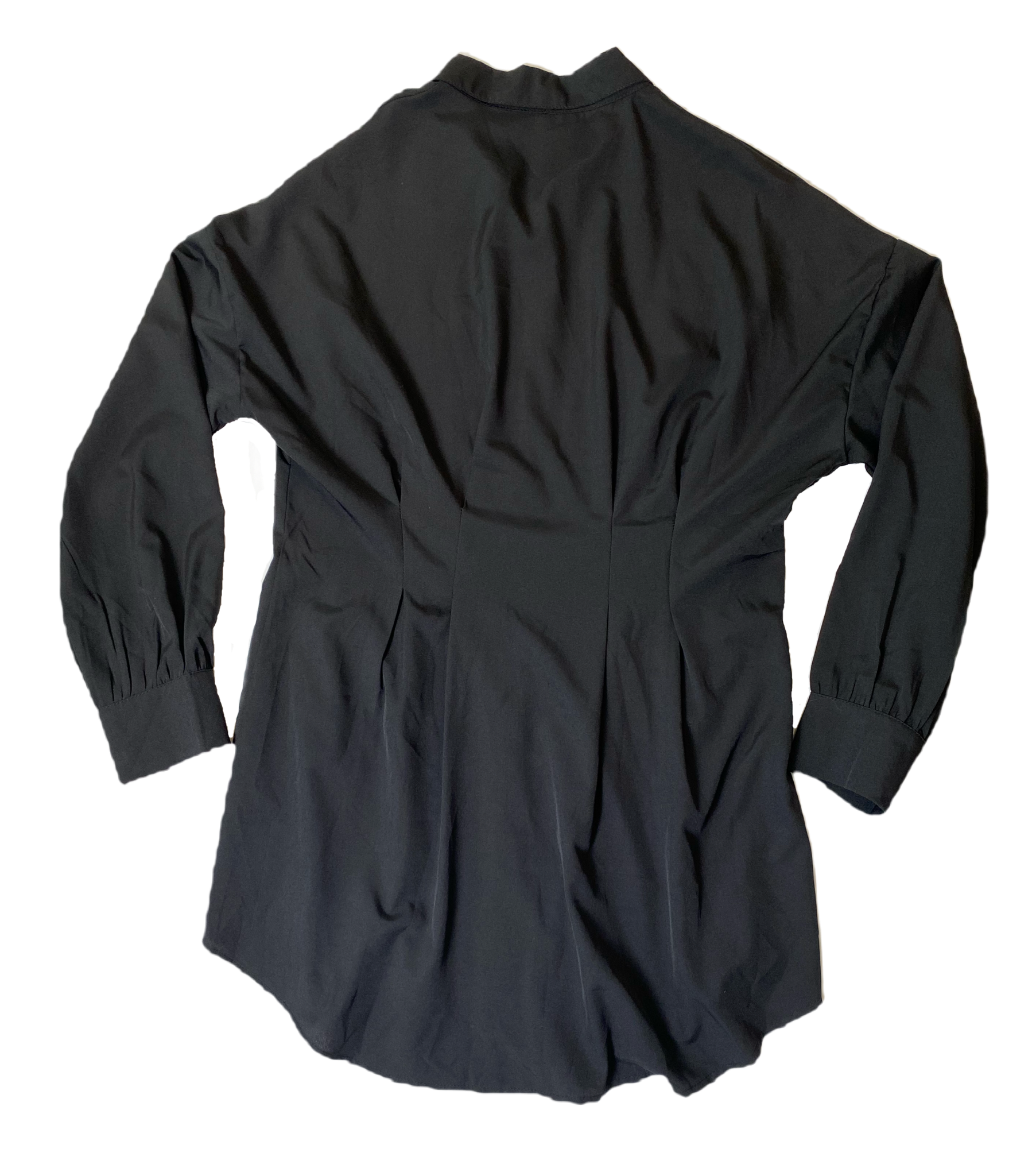 Long Black Button Front ShirtLong black light weight button front shirt with long sleeves and darts at waist.
This is such a great piece! You can wear it as a long shirt with jeggings and boots