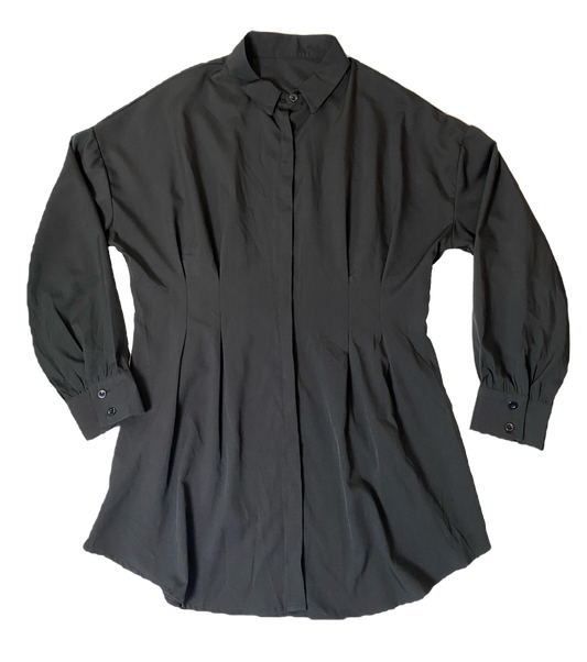 Long Black Button Front ShirtLong black light weight button front shirt with long sleeves and darts at waist.
This is such a great piece! You can wear it as a long shirt with jeggings and boots