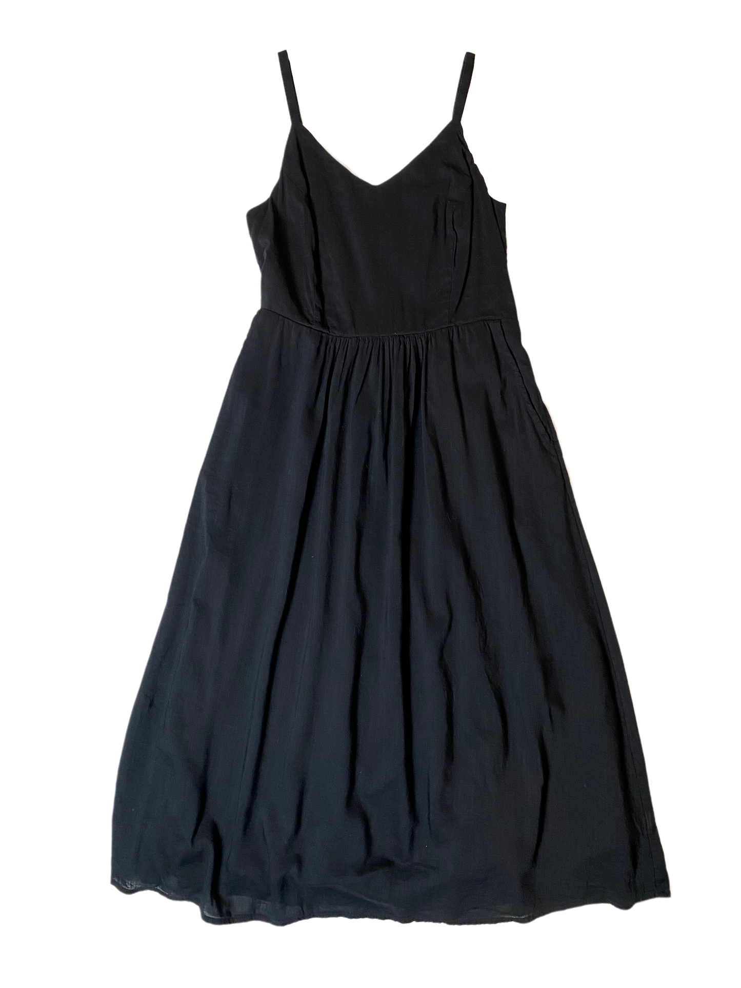 Old Navy Black Cami Sundress Time to update your little black sundress! This dress has it all....spaghetti straps, elastic back, lining, AND POCKETS! Not only will you look fabulous in this, but