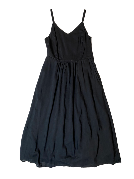 Old Navy Black Cami Sundress Time to update your little black sundress! This dress has it all....spaghetti straps, elastic back, lining, AND POCKETS! Not only will you look fabulous in this, but