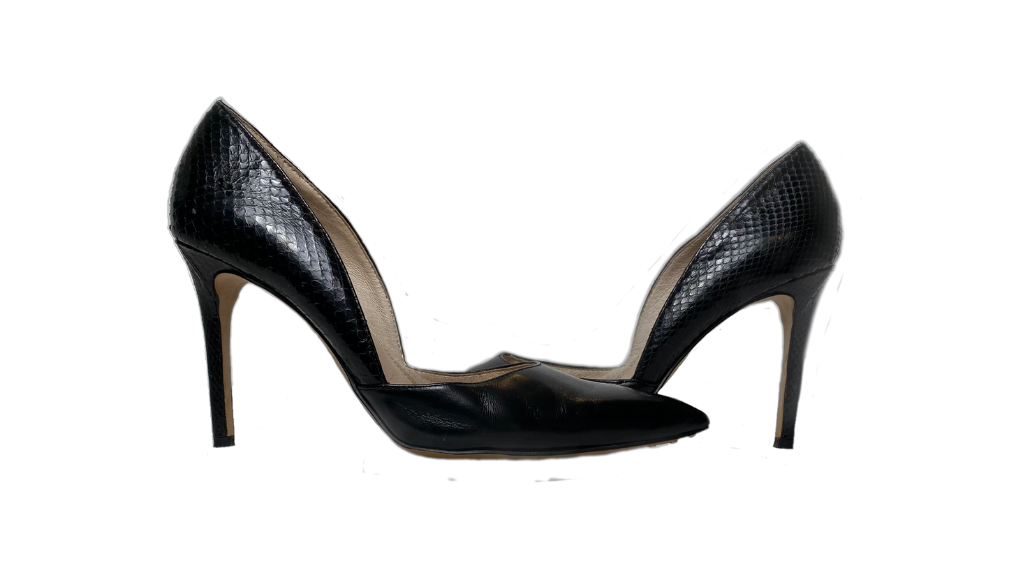 Louie et Cie Black D'Orsay Pumps Classic black d'orsay pump with Amazon Snakeskin on the back half of shoe and Coastal Calf Leather on the front. They feature 3.5" heels.
Looking for the ideal shoe