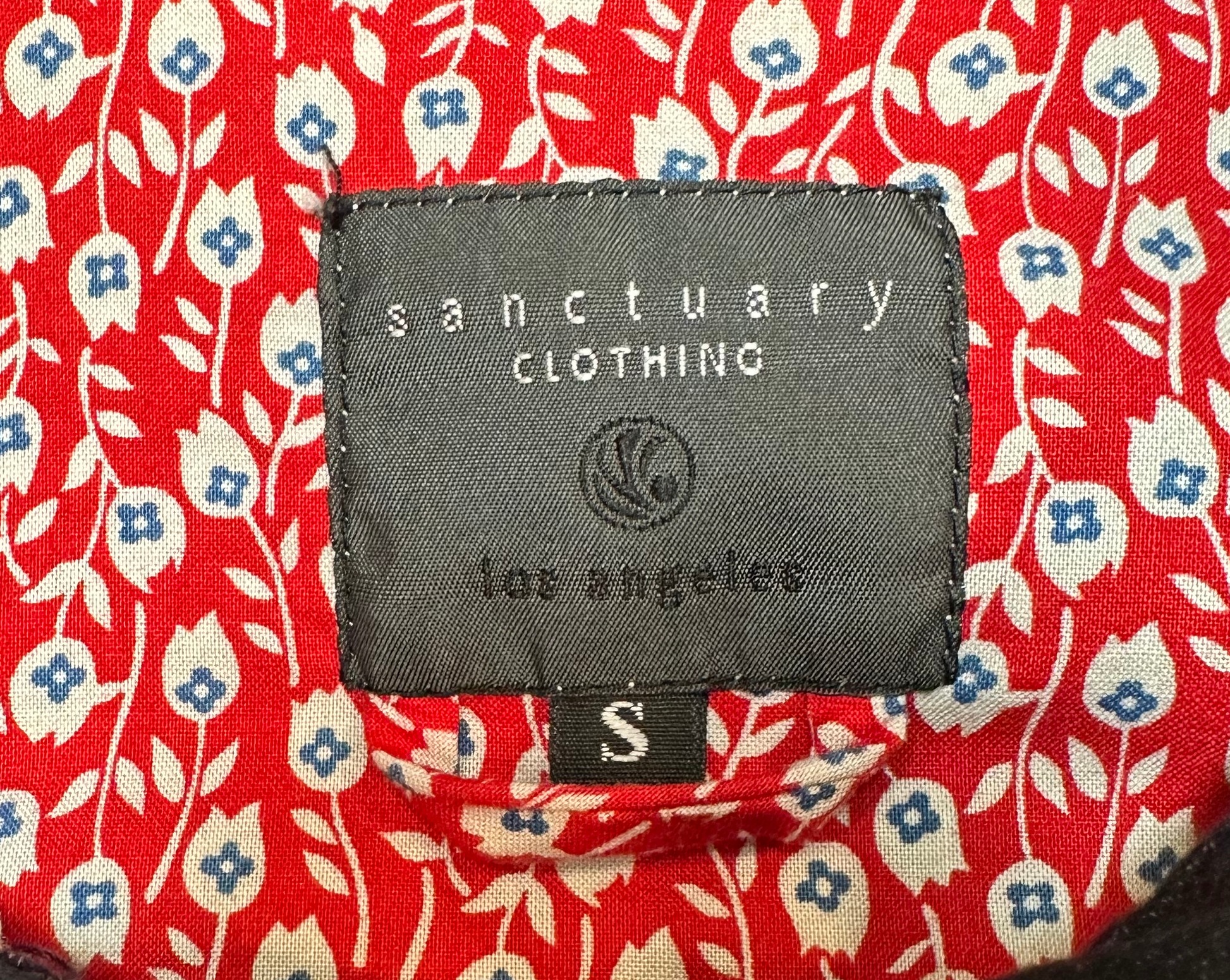 Sanctuary Clothing Black Denim JacketThe "Peter Pan" collar and white top stitching on this jacket add such nice detail, not to mention the button flap pockets!