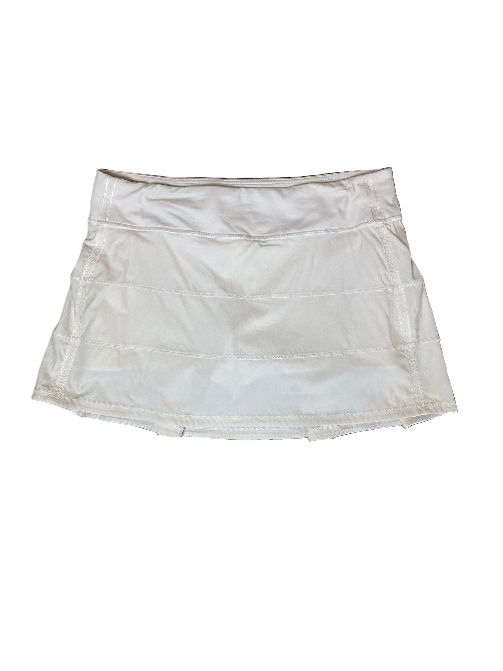 Lululemon White Skort Look stylish and stay organized with this Lululemon white skort! Crafted with pleats and equipped with hidden pockets, this skort has got your back (literally). Get