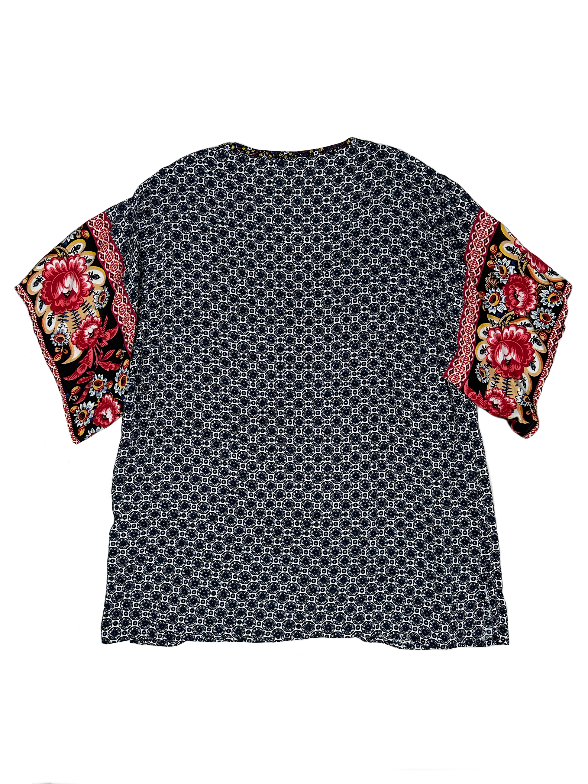 Weekend by Suzanne Betro Printed Short Sleeve Blouse Freshen up your look with this weekend-ready top from Suzanne Betro! Its light rayon fabric and playful print will be sure to make a statement. And don’t forget the